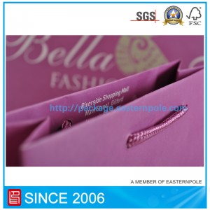 Túi giấy màu tím có tay cầm thắt nút