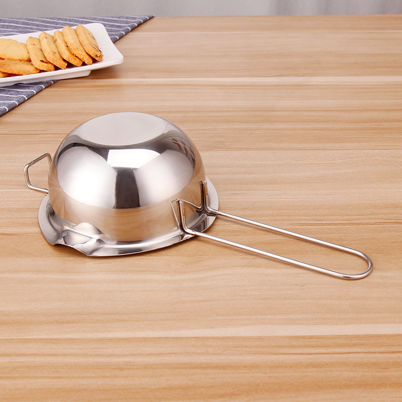 bơ sô cô la làm nóng sữa và mật ong hâm nóng nồi nấu bằng thép không gỉ